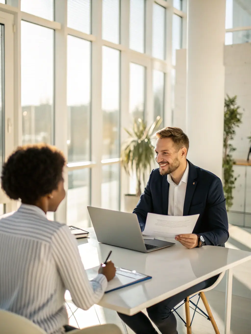 A recruiter interviewing a sales candidate, emphasizing the importance of finding the right talent for a 10X sales team at Impact Coaching Services.